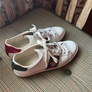 Gucci Women's White Sneakers with Red and Green Accents.